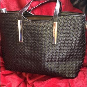 Black purse with add ons